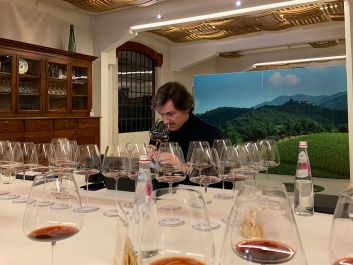 Andrea Lonardi tastes through 25 vintages of Bertani Domains Amarone Classico.                                                                (Robert Camuto)