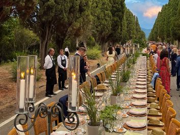 Elegant and audacious: The Bolgheri appellation's tentless outdoor dinner along the 19th-century Viale dei Cipressi, lined with more than 2,500 cypresses                                                                (Robert Camuto)