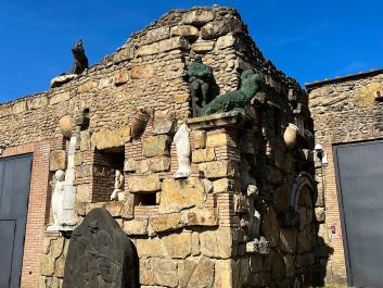 Castello Romitorio's modern winery is disguised by an ancient-looking facade decorated with sculptures by owner and renowned Italian artist Sandro Chia.                                                                (Robert Camuto)