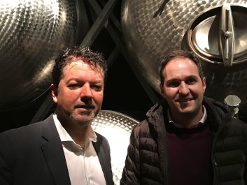 Enologist Klaus Gasser, left, and winemaker Rudi Kofler in the Terlano cellars, where some whites are aged 10 years, or even decades, on their lees.                                                                 (Robert Camuto)