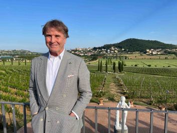 Brunello Cucinelli overlooking vineyard